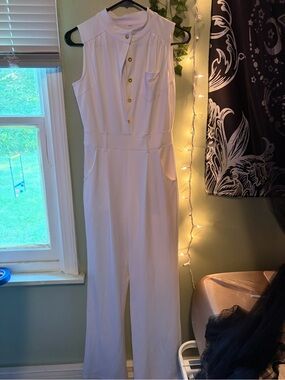 Sleeveless White Jumpsuit with Gold-Tone Buttons